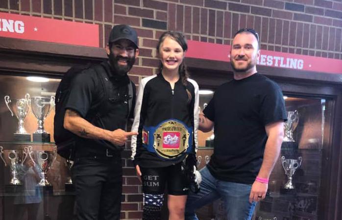 Hancock takes first in girls’ wrestling championship